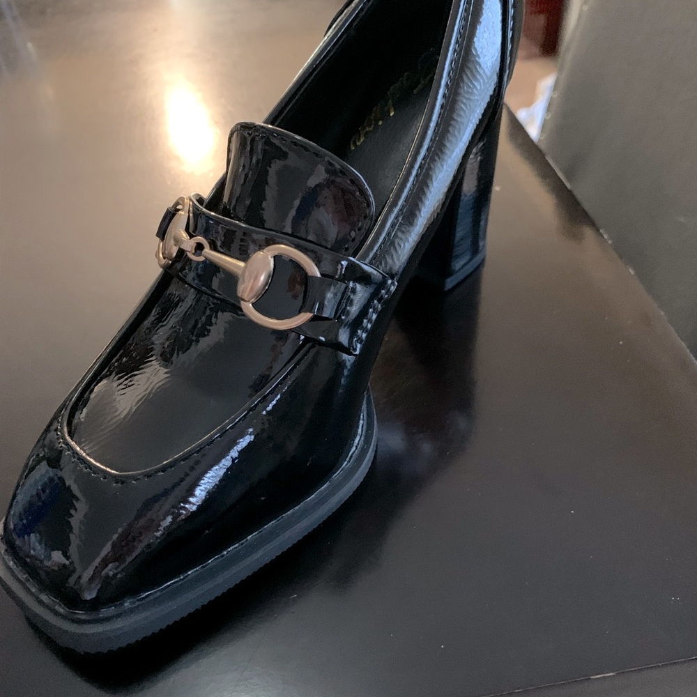 Brand new 3 inch chunky faux patent leather loafer with gold bit detail.